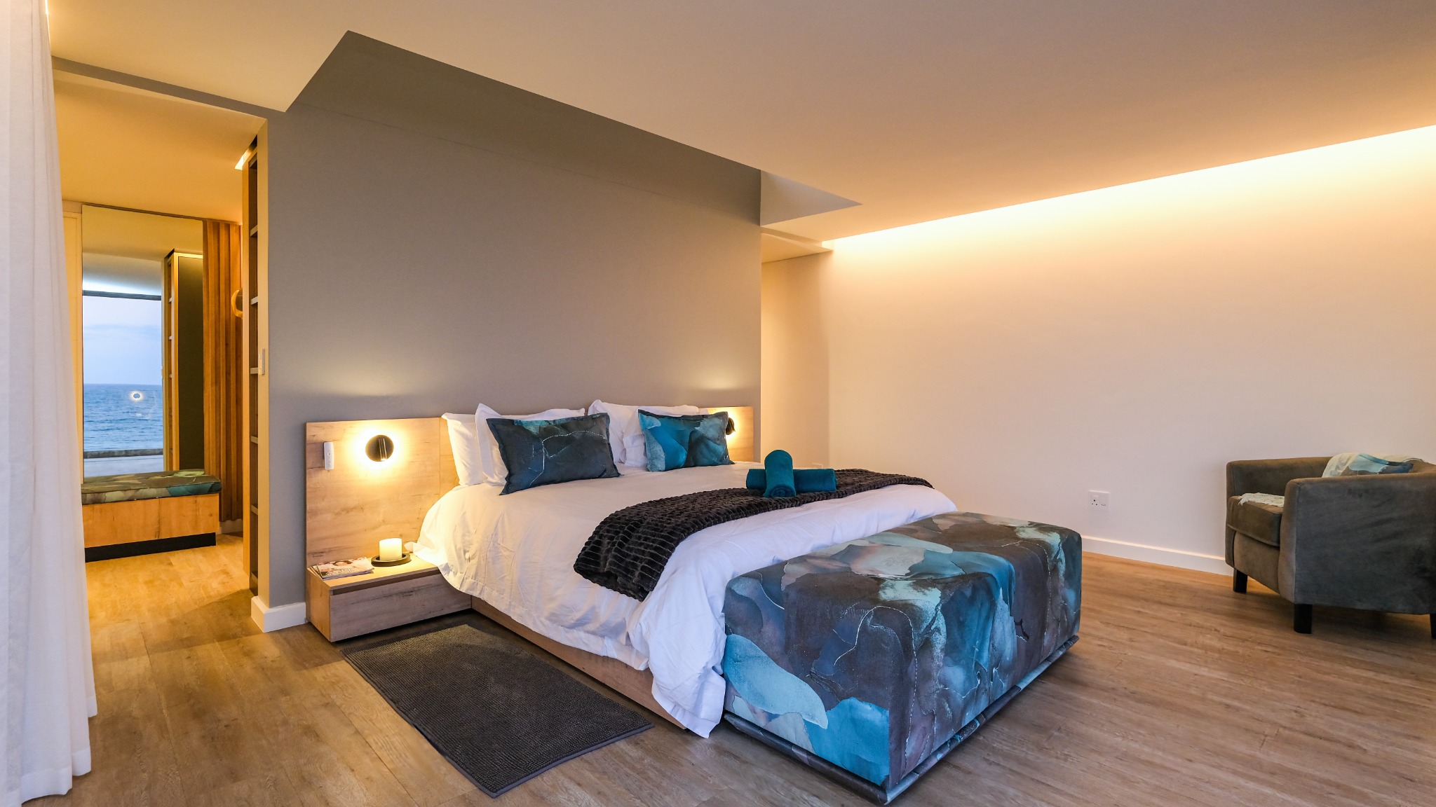 Welcoming bedroom suite with warm lighting